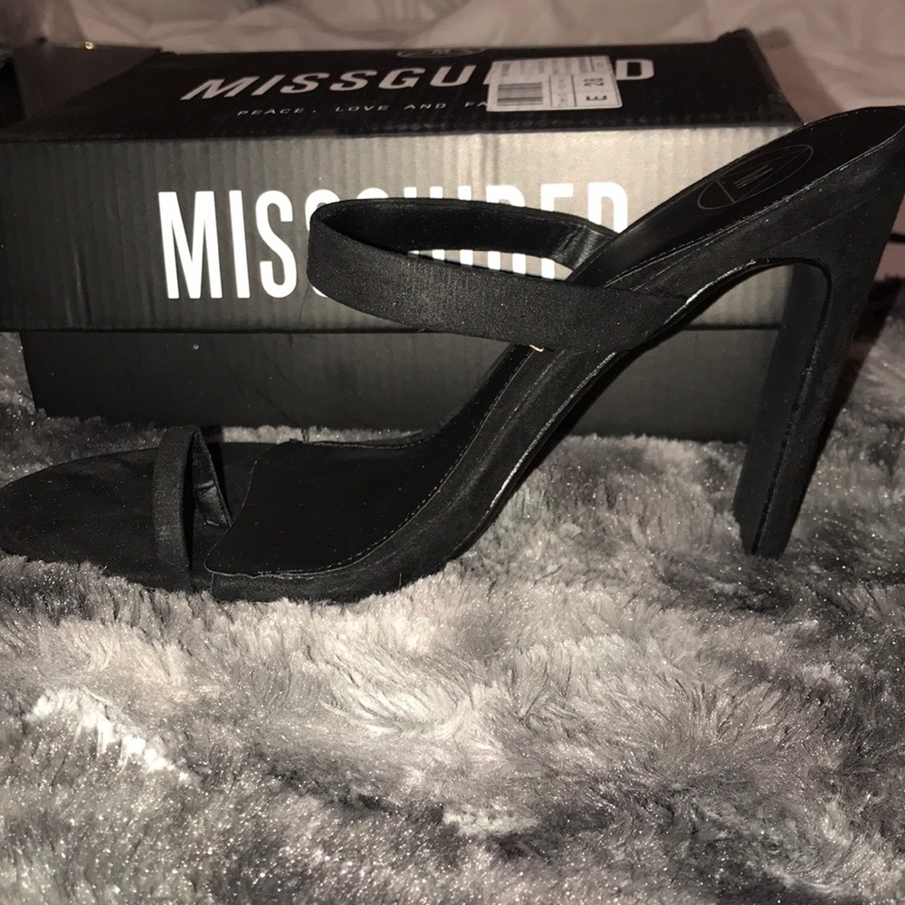 Black heeled mules